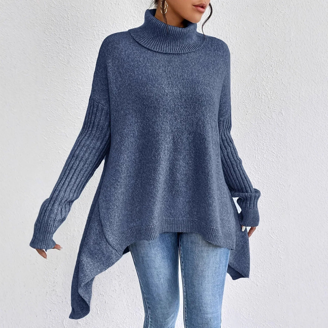 Women's oversized turtleneck sweater with asymmetric hem and side splits