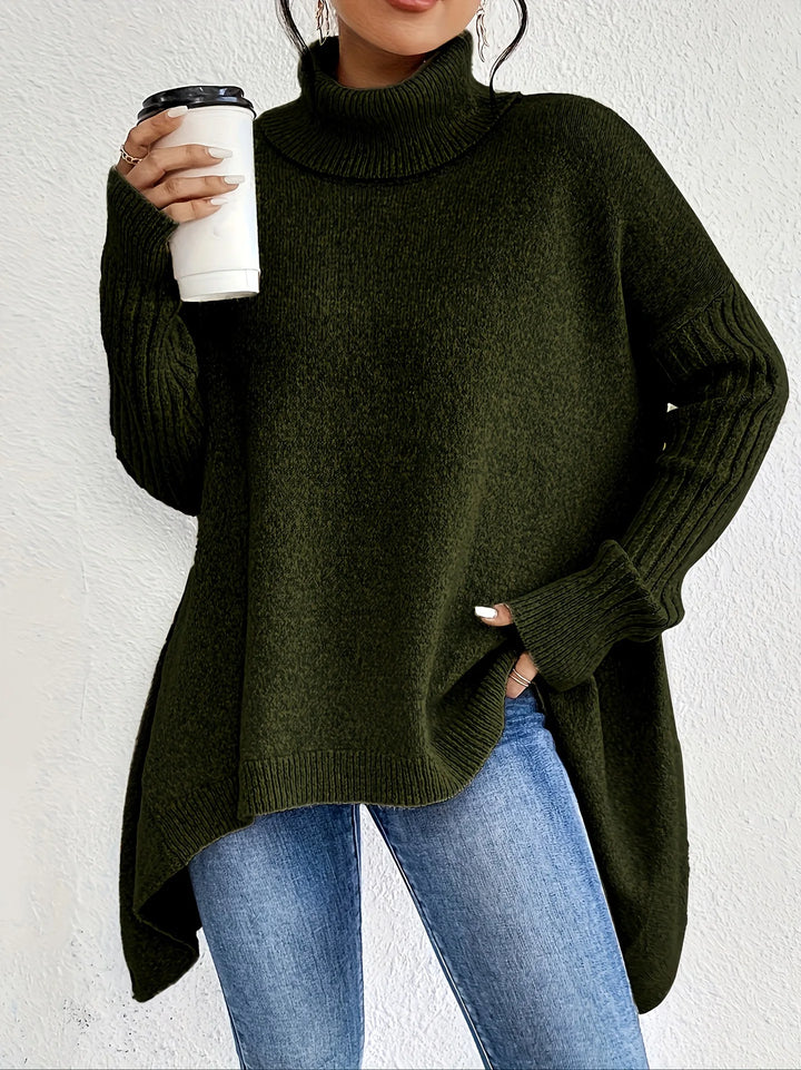 Women's oversized turtleneck sweater with asymmetric hem and side splits