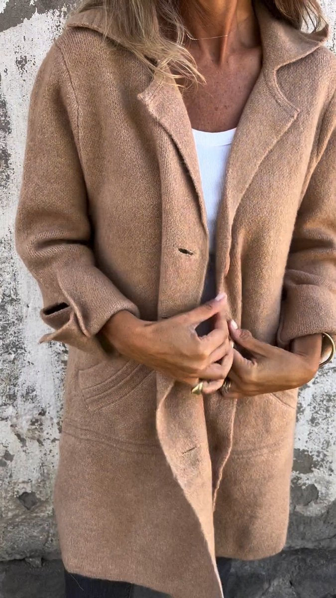 Women's oversized long coat with wide lapels, button front and cuffed sleeves