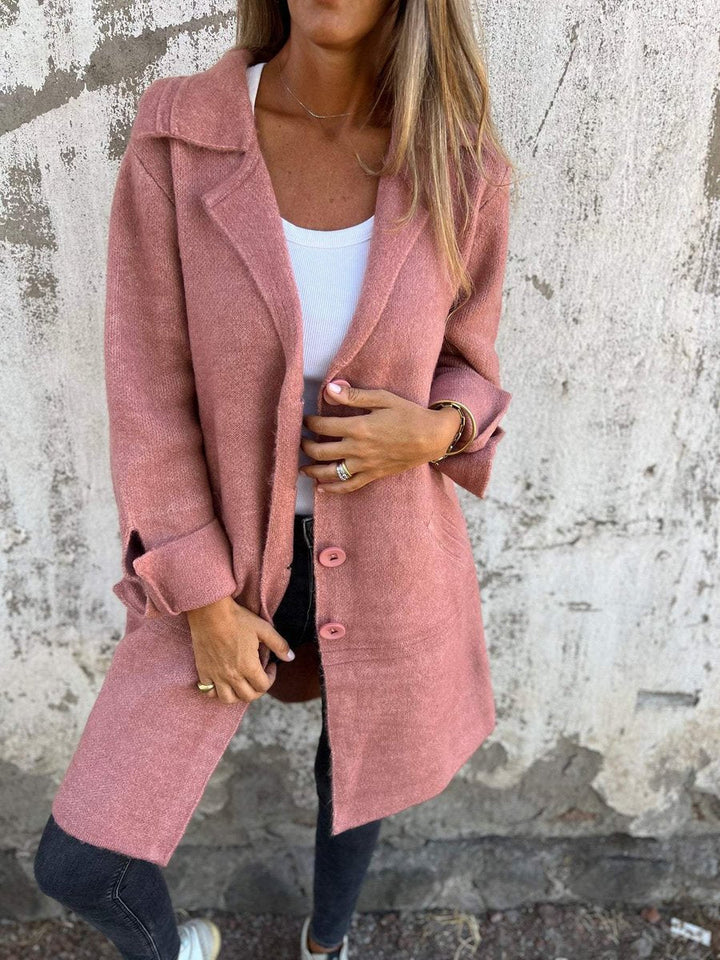 Women's oversized long coat with wide lapels, button front and cuffed sleeves