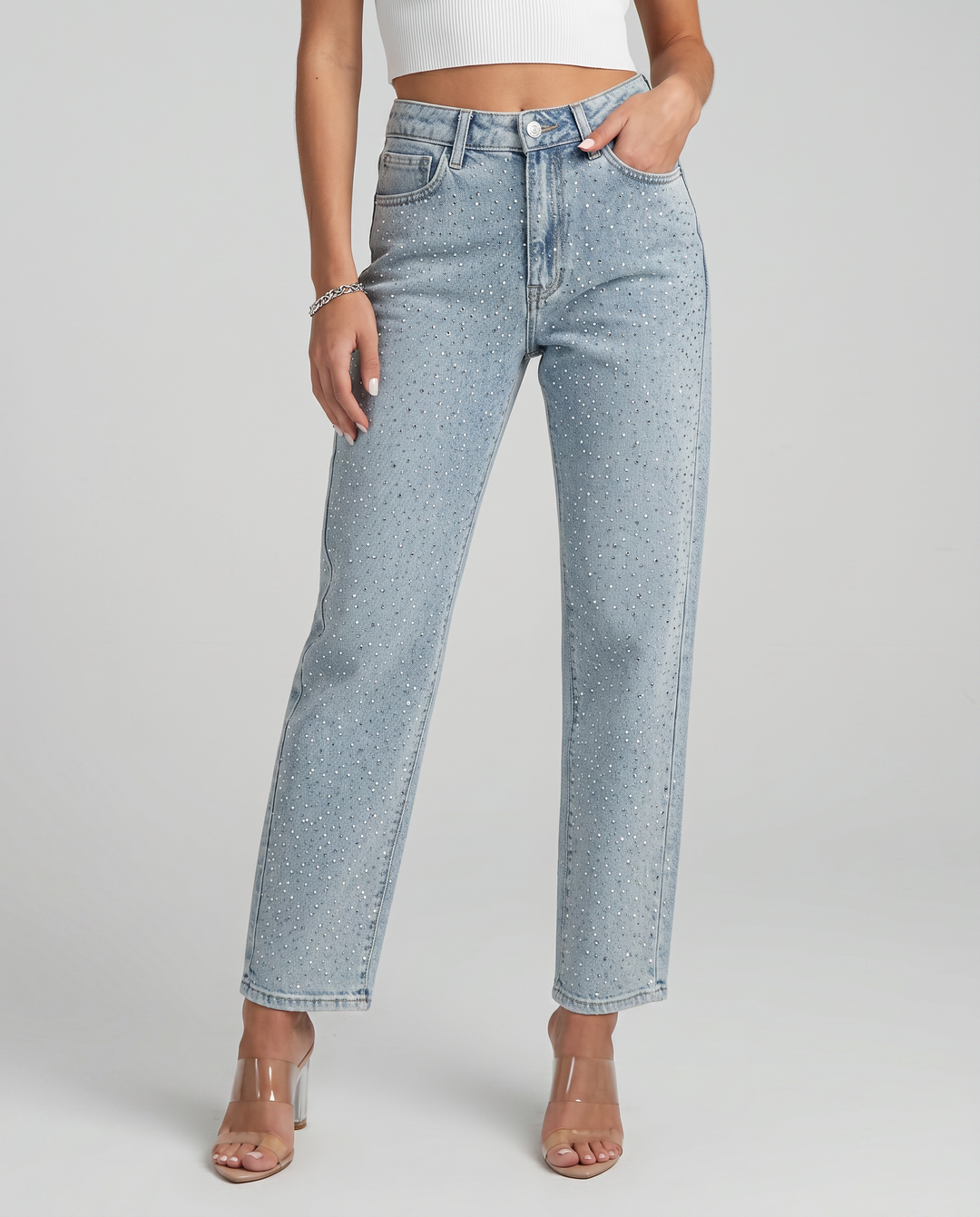 Women's light blue high-rise straight-leg jeans with reflective embellishments