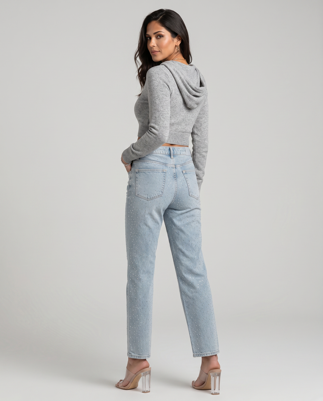 Women's light blue high-rise straight-leg jeans with reflective embellishments
