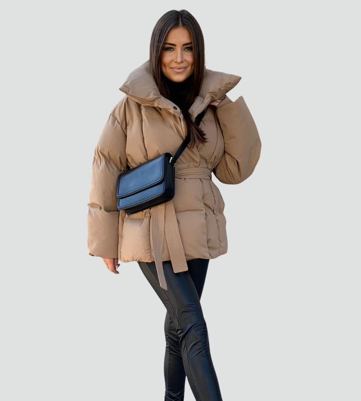 Women's quilted puffer jacket with high collar and tied waist belt