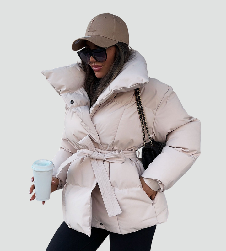 Women's quilted puffer jacket with high collar and tied waist belt