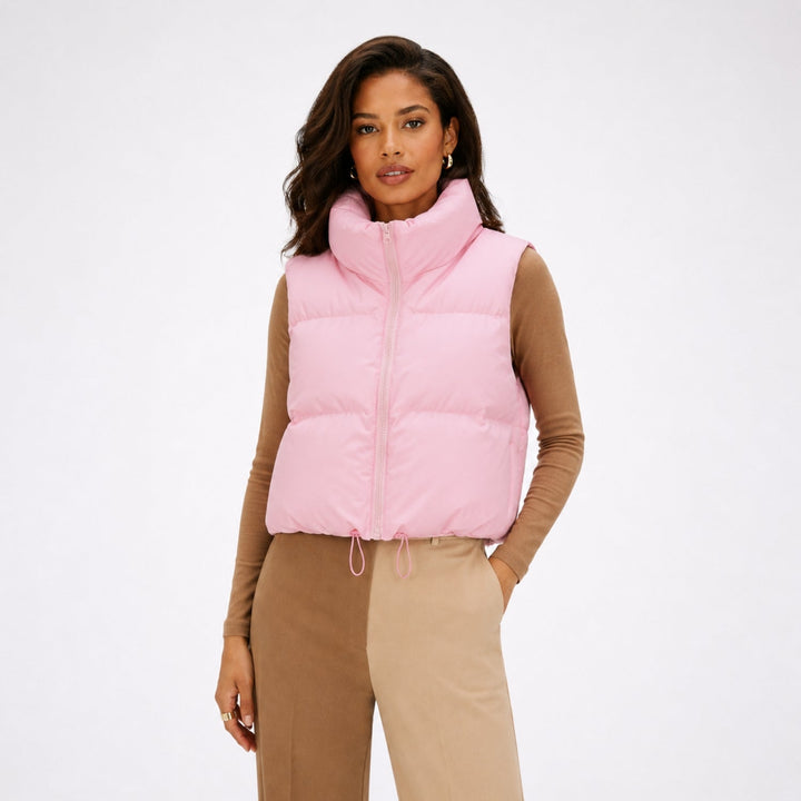 Women's cropped quilted puffer vest with mock neck and zip front