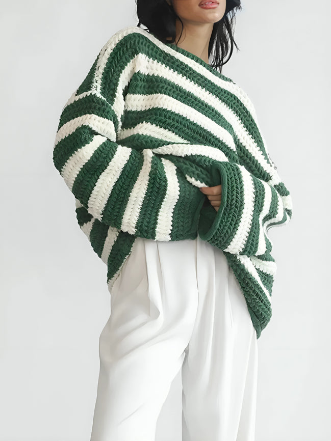 Women's oversized chunky knit sweater with bold horizontal stripes and long sleeves
