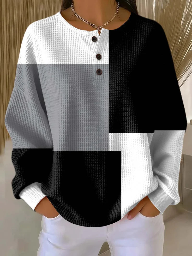 Women's geometric black white and gray color block waffle sweatshirt with button crew neckline