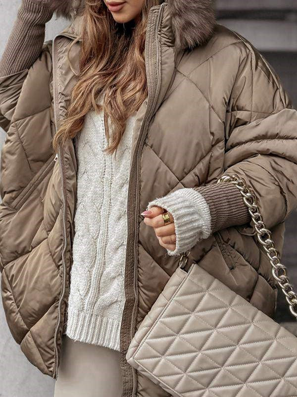 Women's quilted hooded puffer coat with diamond stitching and plush hood trim