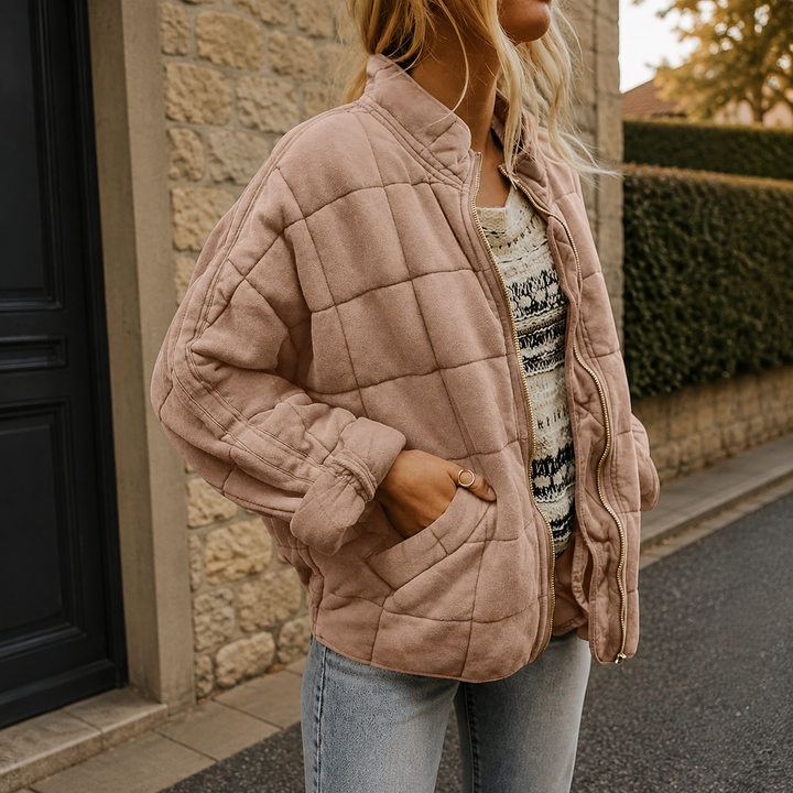 Women's relaxed quilted jacket with stand collar, long sleeves, zip front and patch pockets