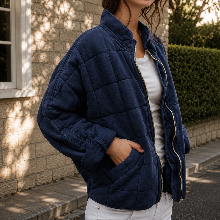 Women's relaxed quilted jacket with stand collar, long sleeves, zip front and patch pockets