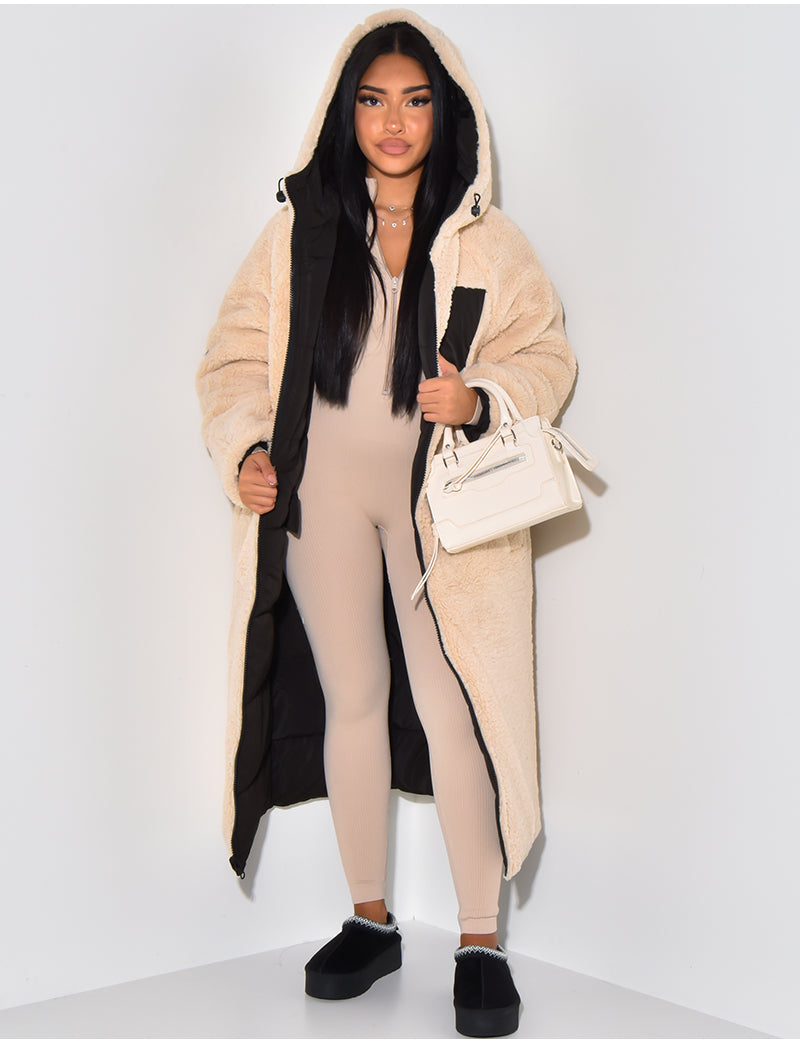 Women's long reversible hooded puffer coat shown with quilted and textured sides