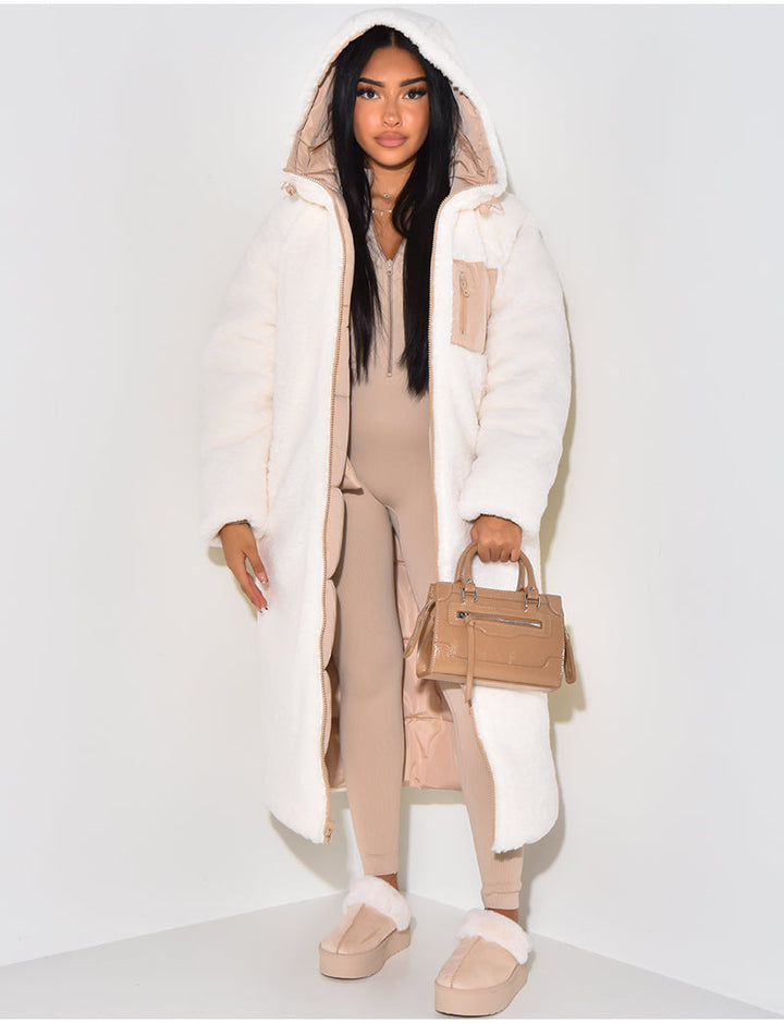 Women's long reversible hooded puffer coat shown with quilted and textured sides
