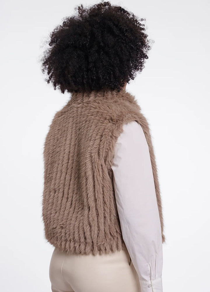 Women's brown shaggy faux fur gilet with a sleeveless cut and broad collar
