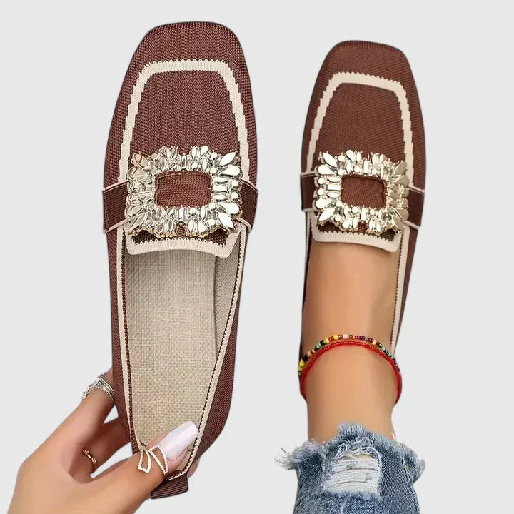 Women's square-toe loafers with contrasting trim and decorative buckle detail