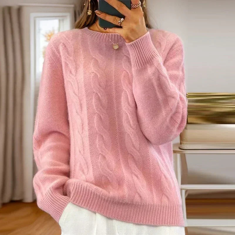 Women's cable knit crew neck sweater with long sleeves and ribbed trims