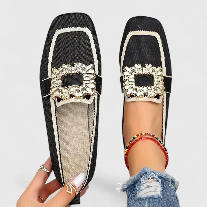 Women's square-toe loafers with contrasting trim and decorative buckle detail