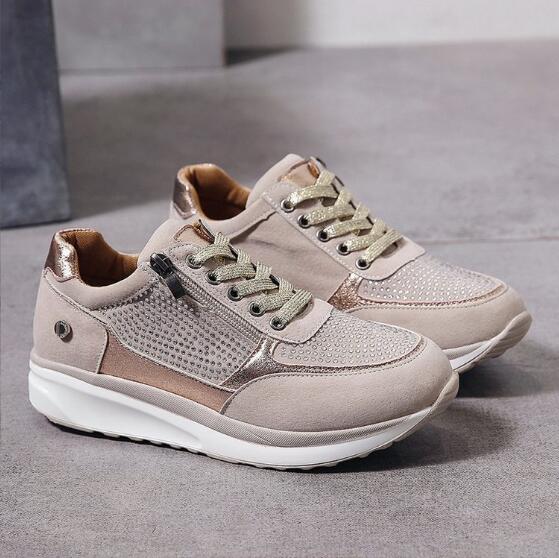Women's low-cut lace-up sneakers with perforated panels and contrasting soles