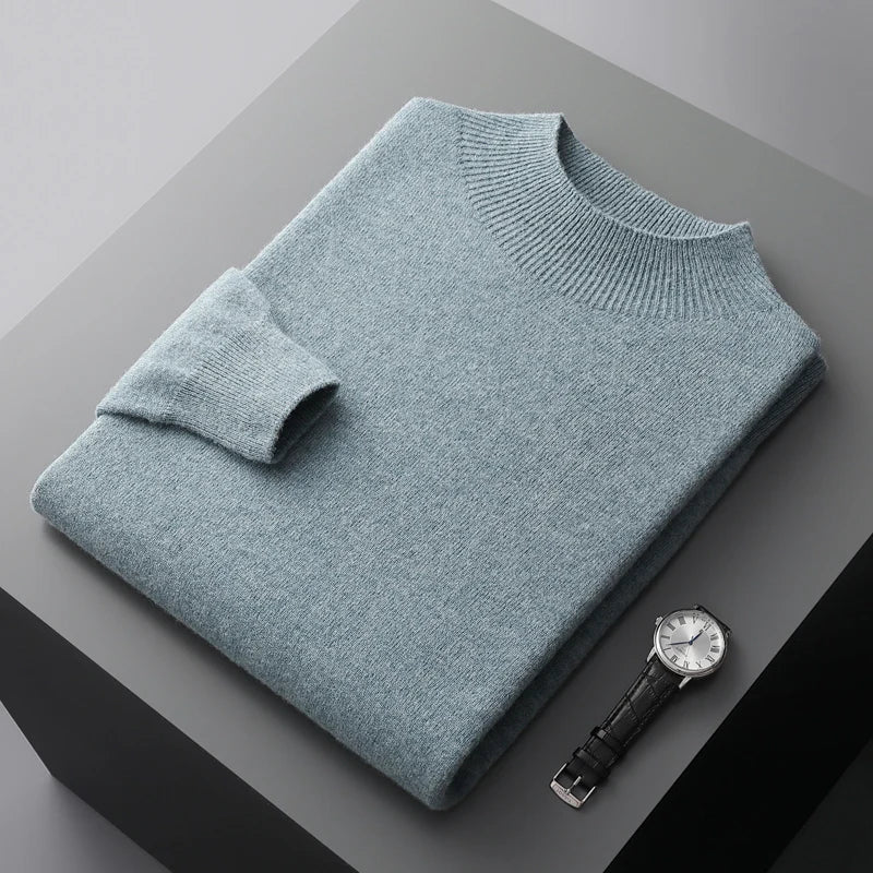 Folded solid knit sweater with ribbed crew neckline and cuffs