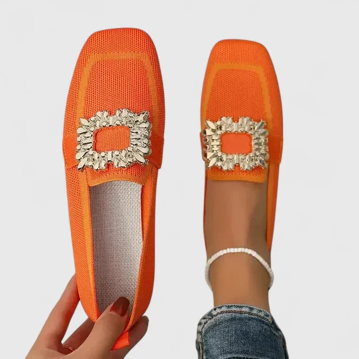 Women's square-toe loafers with contrasting trim and decorative buckle detail