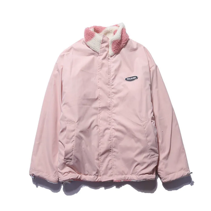 Reversible jacket with heart-patterned textured side, high collar and zip front