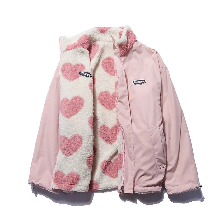 Reversible jacket with heart-patterned textured side, high collar and zip front