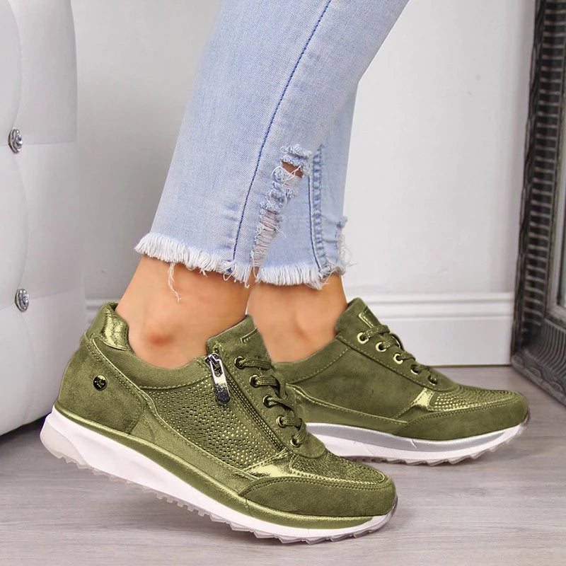 Women's low-cut lace-up sneakers with perforated panels and contrasting soles