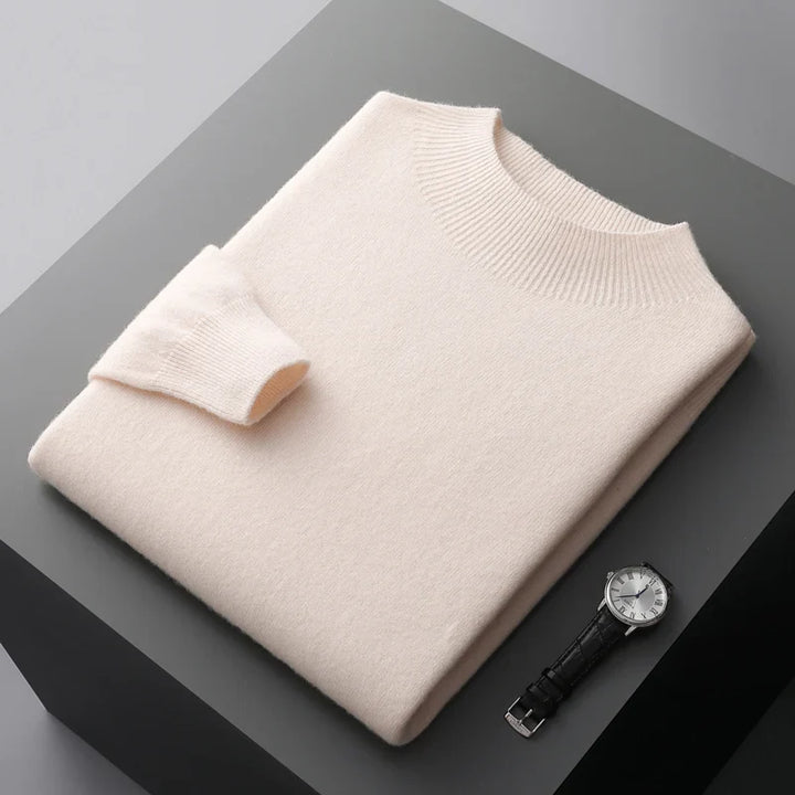 Folded solid knit sweater with ribbed crew neckline and cuffs