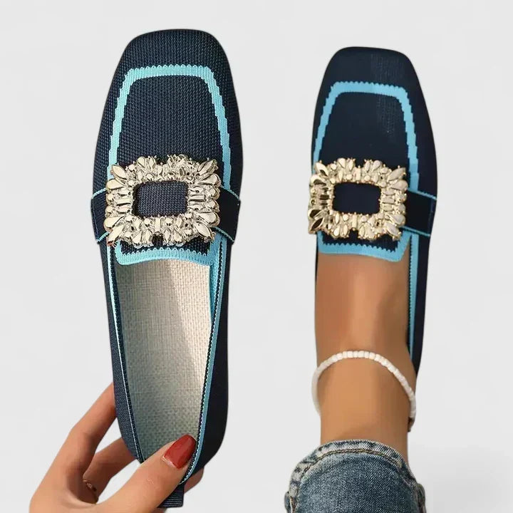 Women's square-toe loafers with contrasting trim and decorative buckle detail