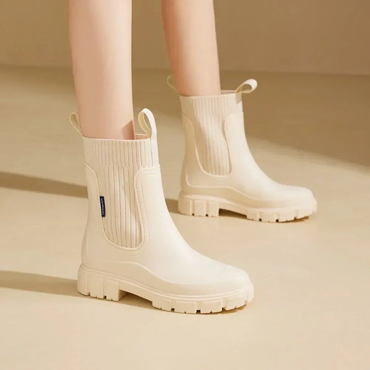 Women's Chelsea ankle rain boots with elastic panels and chunky treaded soles