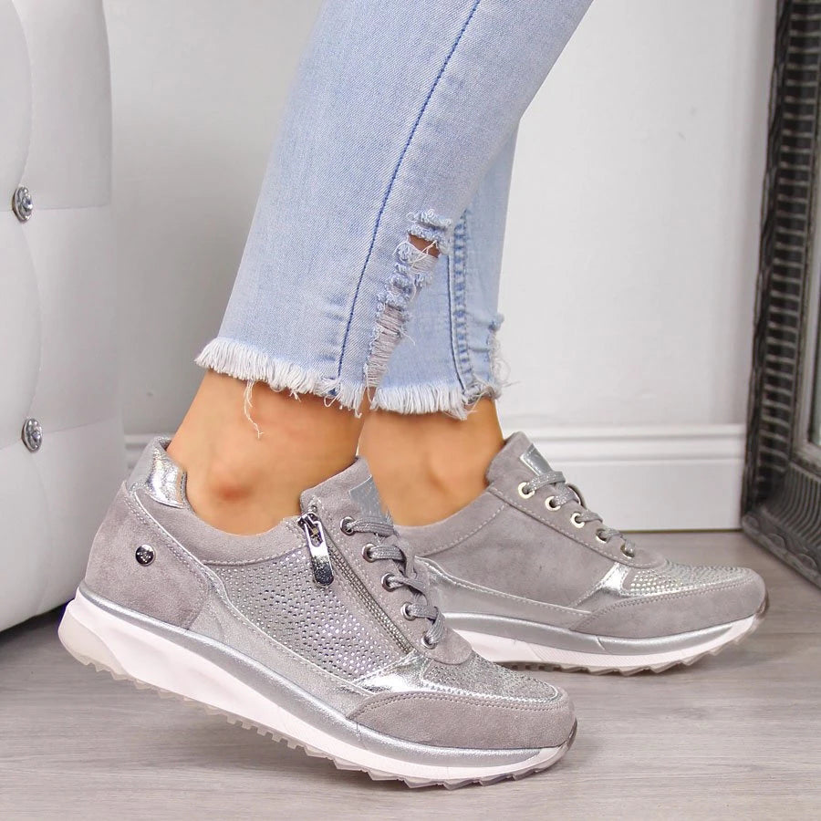 Women's low-cut lace-up sneakers with perforated panels and contrasting soles