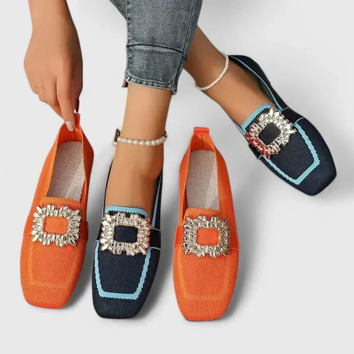 Women's square-toe loafers with contrasting trim and decorative buckle detail