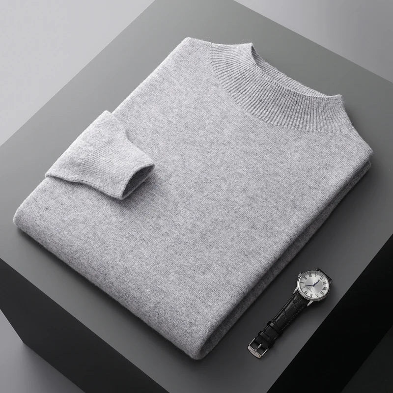 Folded solid knit sweater with ribbed crew neckline and cuffs