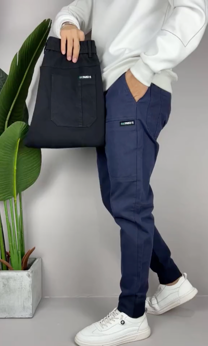 Unisex tapered cargo trousers with side pockets and ankle cuffs