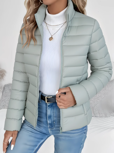 Women's quilted jacket with high stand collar, long sleeves and zip front