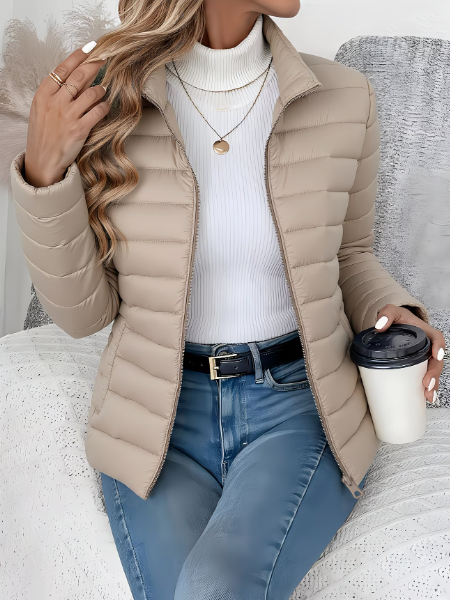 Women's quilted jacket with high stand collar, long sleeves and zip front