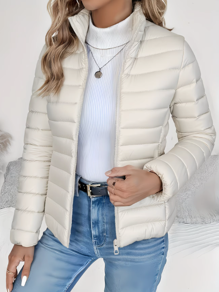 Women's quilted jacket with high stand collar, long sleeves and zip front