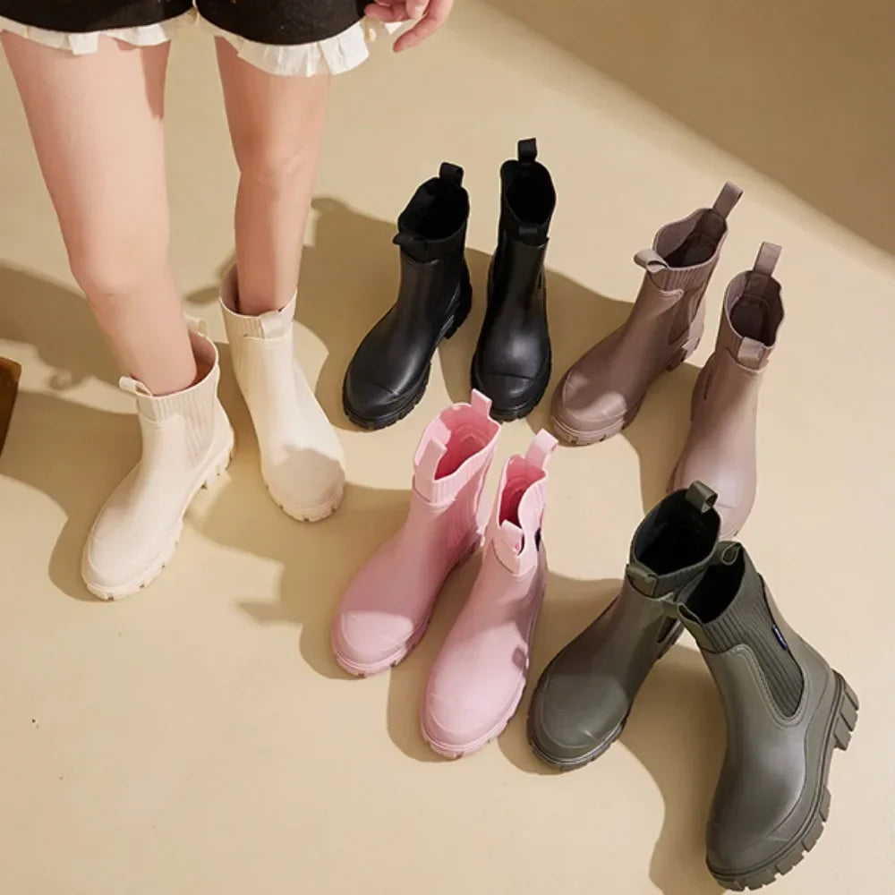 Women's Chelsea ankle rain boots with elastic panels and chunky treaded soles