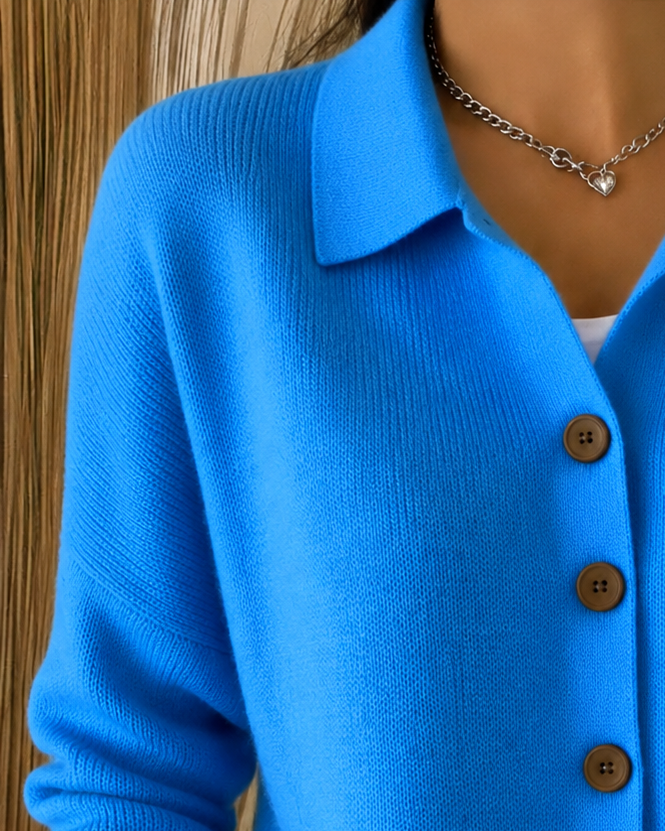 Women's collared knit cardigan with long sleeves and button front