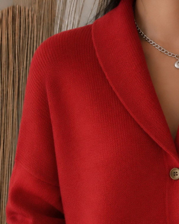 Women's collared knit cardigan with long sleeves and button front