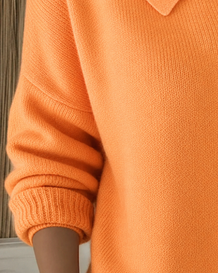 Women's collared knit cardigan with long sleeves and button front