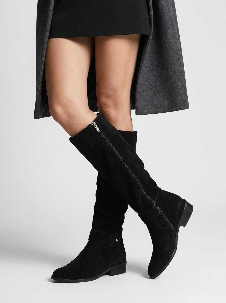 Women's knee-high boots with low block heels, side zippers and decorative straps