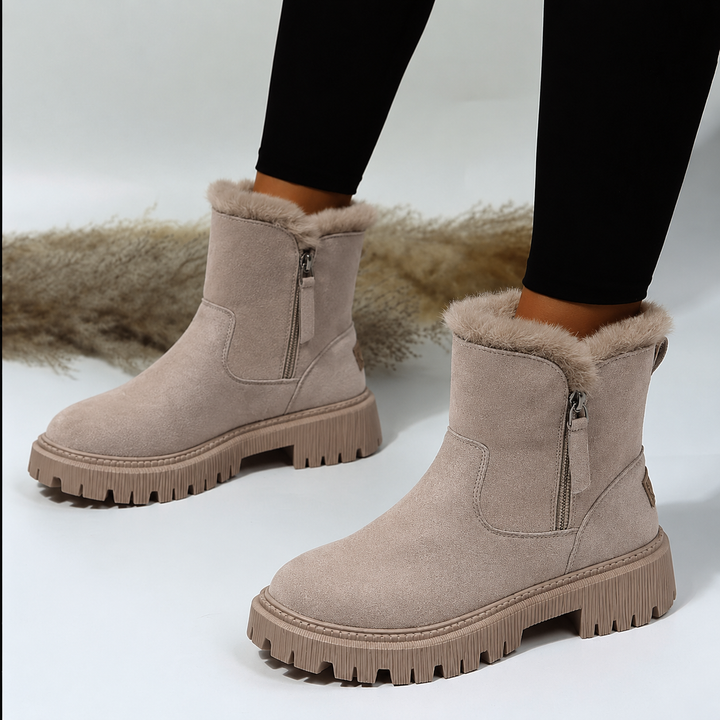 Women's ankle boots with plush trim, side zipper and chunky lug sole