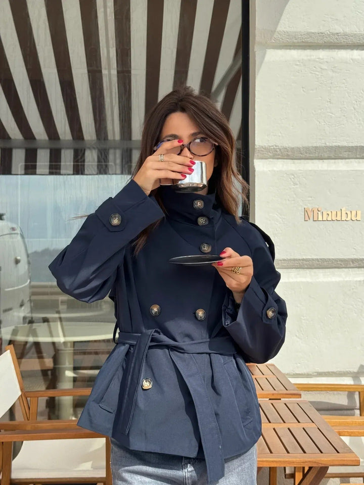 Women's belted short jacket with stand collar, long sleeves and button front