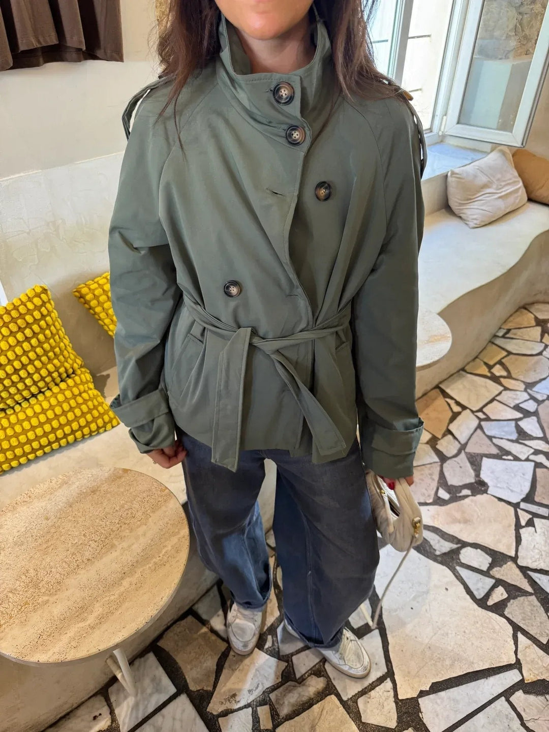 Women's belted short jacket with stand collar, long sleeves and button front