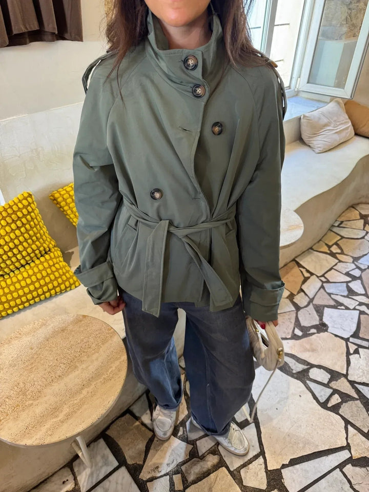 Women's belted short jacket with stand collar, long sleeves and button front