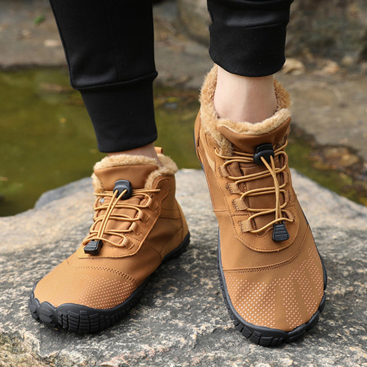 Ankle-height winter barefoot boots with lace-up toggle closure and textured sole