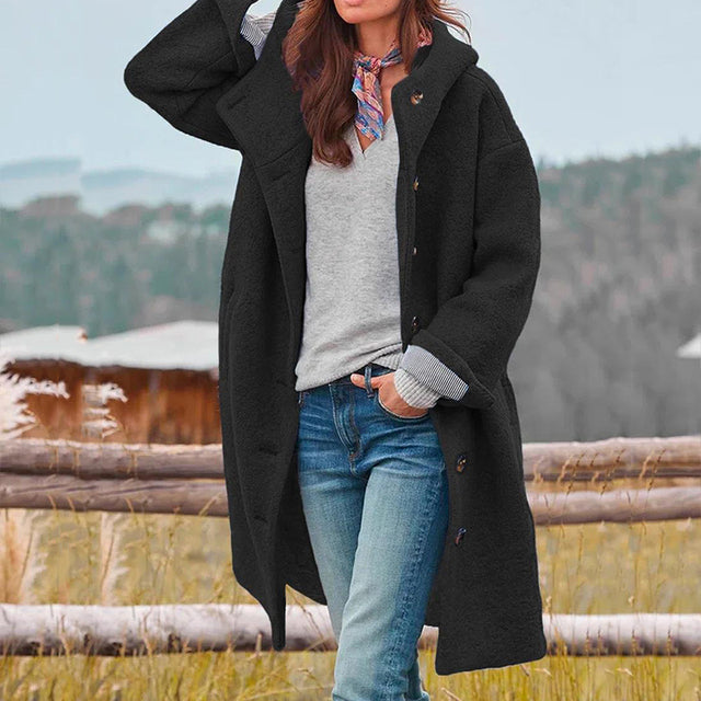Women's long hooded button-front coat with side pockets and long sleeves