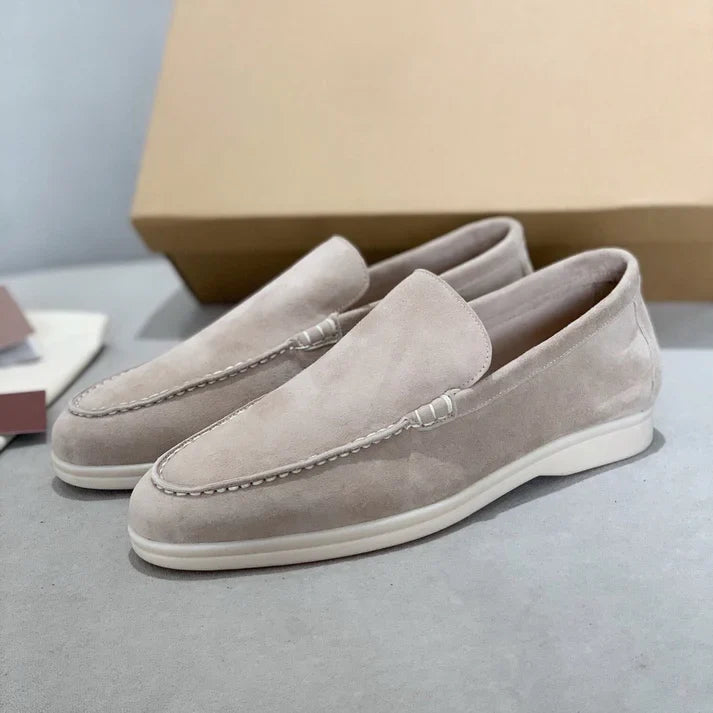Women's suede-finish slip-on loafers with rounded moc toes and contrasting flat soles