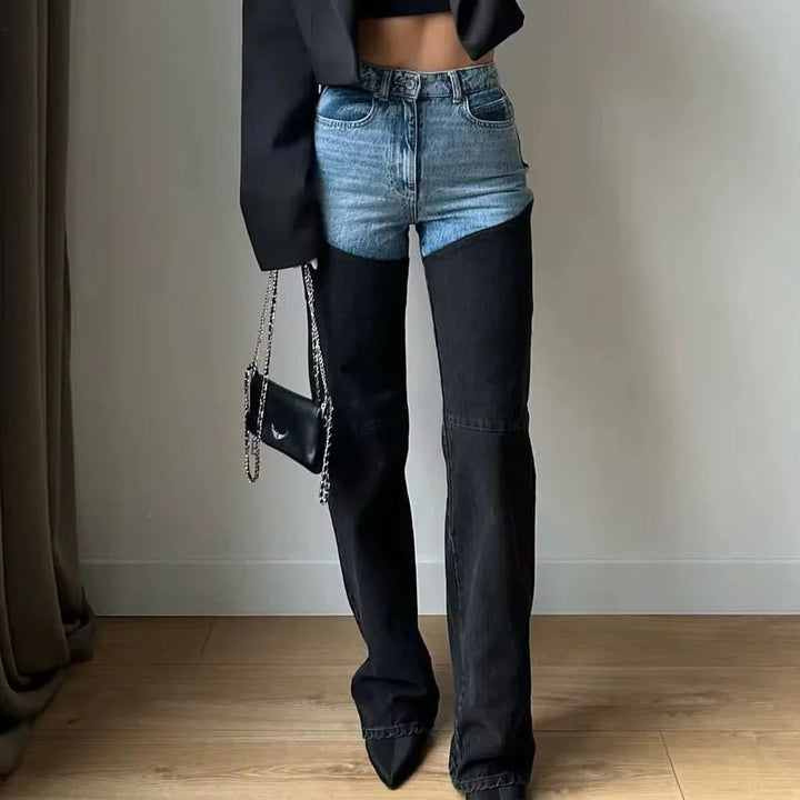 Women's high-waisted two-tone jeans with light blue upper panels and black straight legs