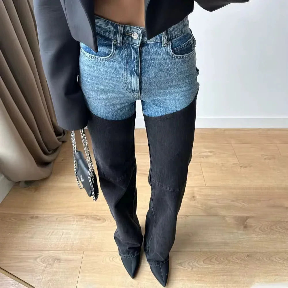 Women's high-waisted two-tone jeans with light blue upper panels and black straight legs